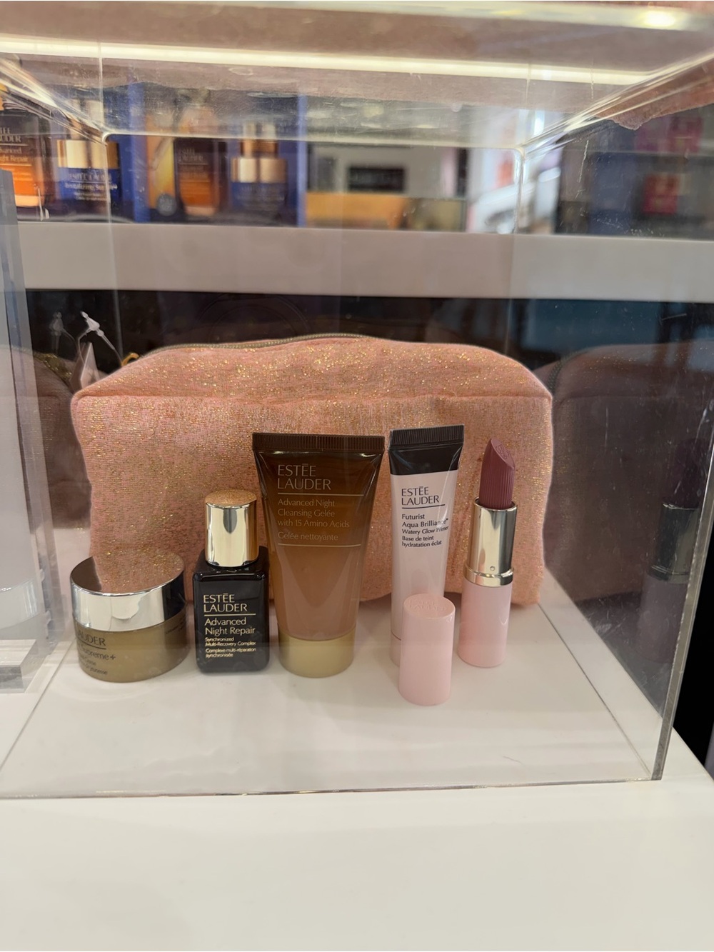 Estee Lauder Pink Glitter Cosmetic Bag with Pink Lipstick and Skincare Trio